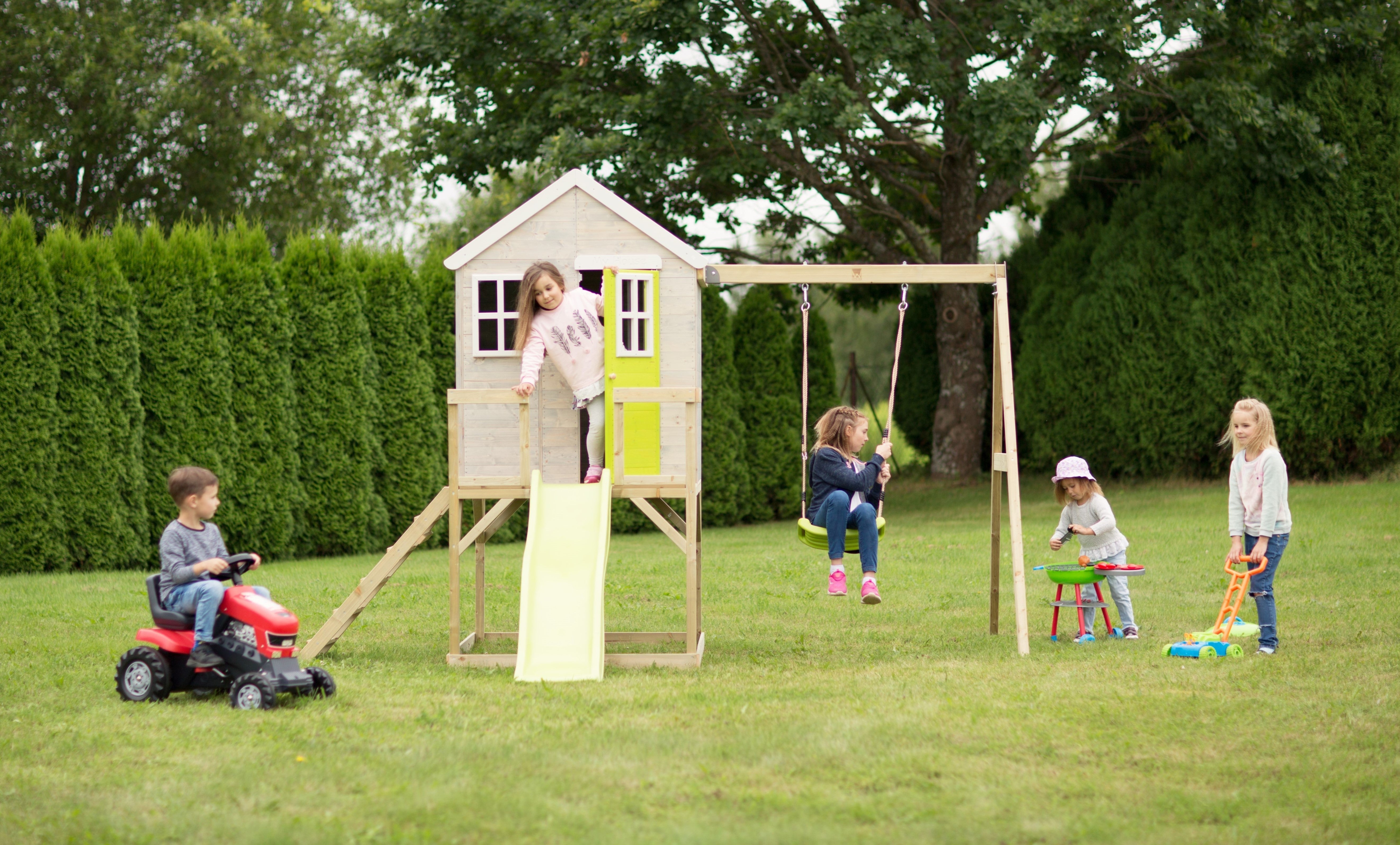 Stylish children's outdoor playhouses with swings, slides, and gym attachments for garden play and imagination